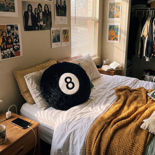 Y2K 8 Ball Pillow styled in a lived-in Y2K room