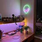 Y2K Alien Invasion Bundle styled on a desk and shelf in a lived-in room