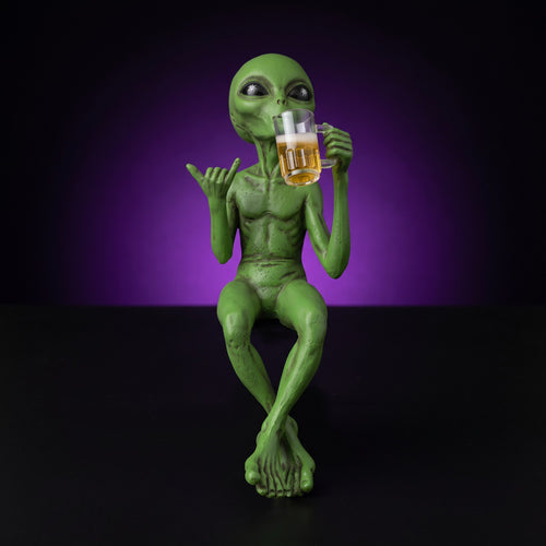 Y2K Alien Statue – studio product shot on dark background with purple glow