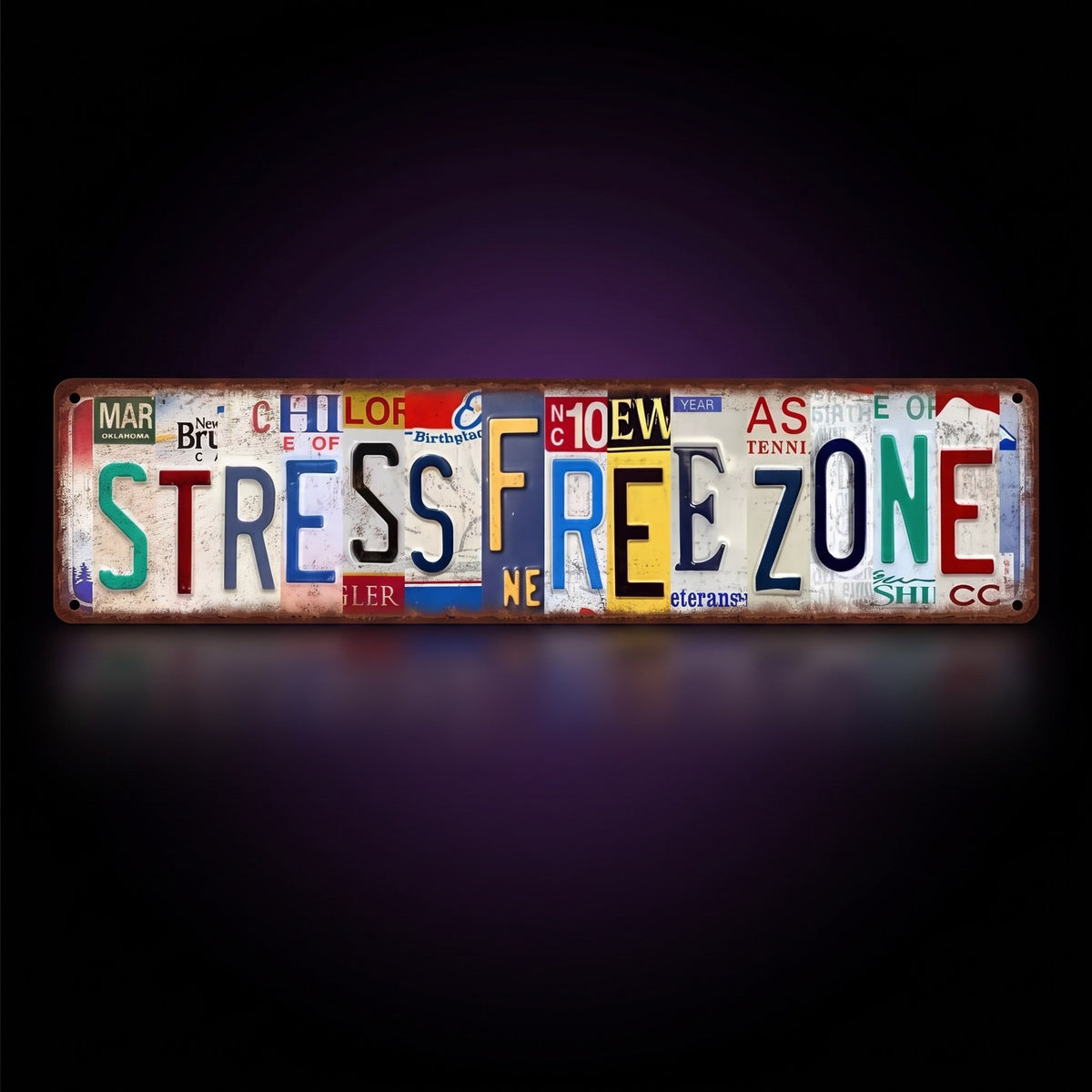 Y2K Stress Free Zone Sign – studio product shot on dark background with purple glow