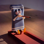 Y2K Funny Towel Incense Holder on a wooden table